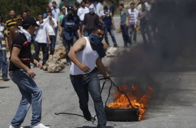 Palestinian riots in Silwad 370 (photo credit: REUTERS)