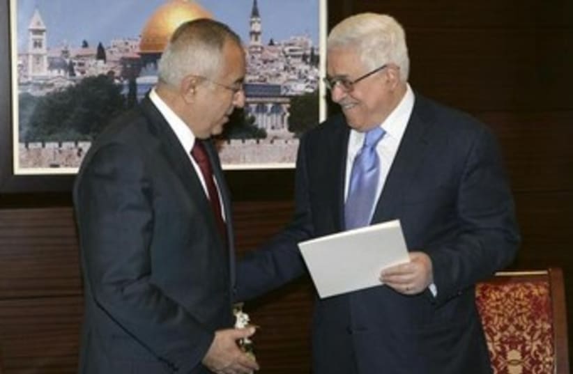 Abbas and Fayyad shake hands 370 (photo credit: REUTERS/Thaer Ganaim/PPO/Handout)