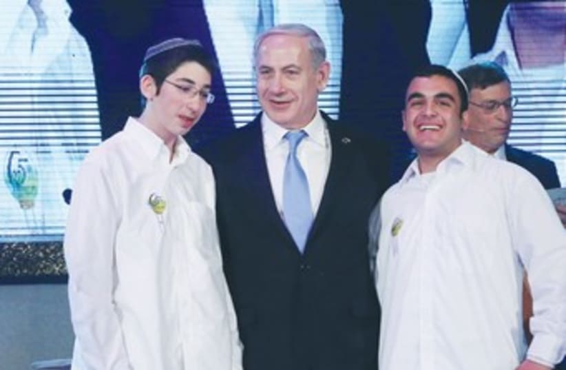 Netanyahu with Bible Quiz winners 370 (photo credit: (Marc Israel Sellem/The Jerusalem Post)