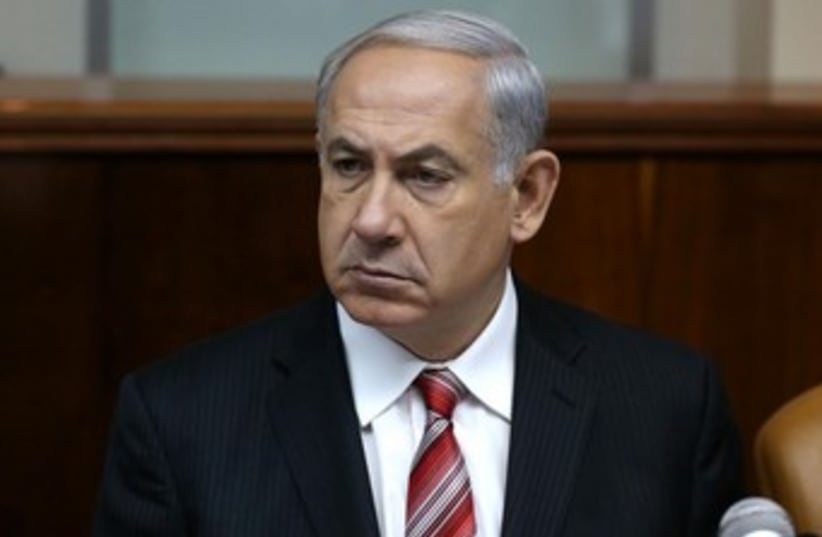 Netanyahu at cabinet meeting 370 (photo credit: Amit Shabi/Yediot Ahronot, pool)