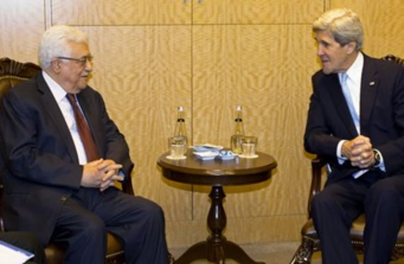 Kerry and Abbas in Istanbul 370 (photo credit: REUTERS/Evan Vucci/Pool)