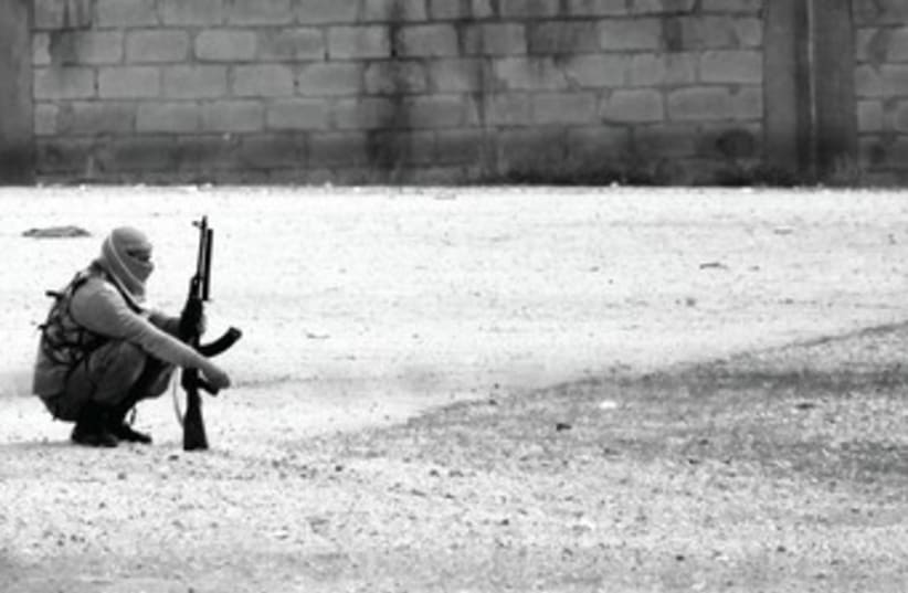 Syrian Kurdish town soldier 370 (photo credit: Reuters)