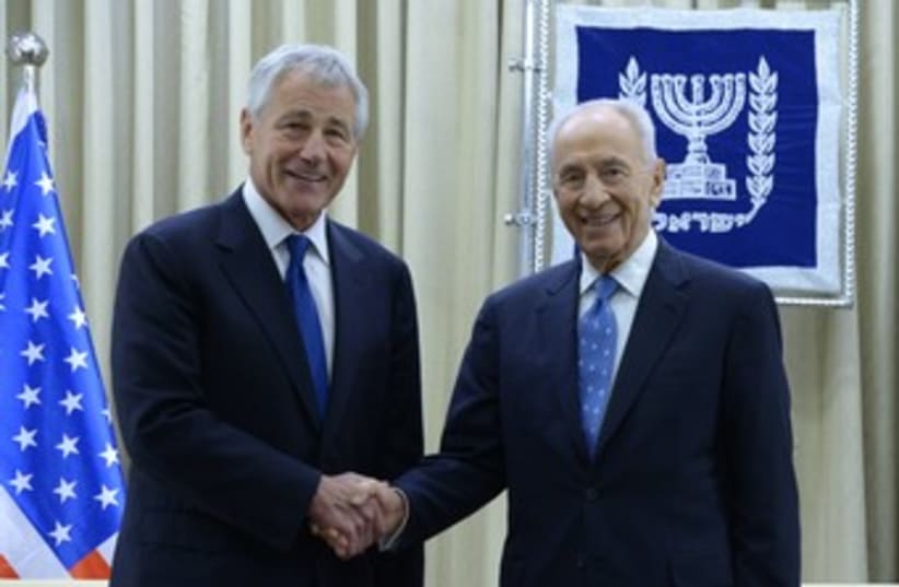 President Shimon Peres, US Secretary of Defense Chuck Hagel  (photo credit: Mark Neiman/GPO)