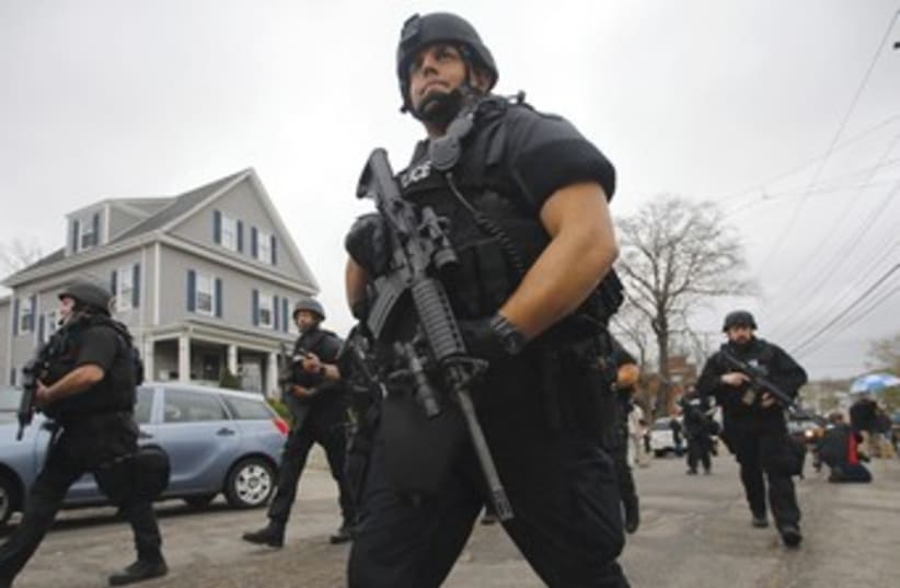 Boston police manhunt 370 (photo credit: Brian Snyder/Reuters)