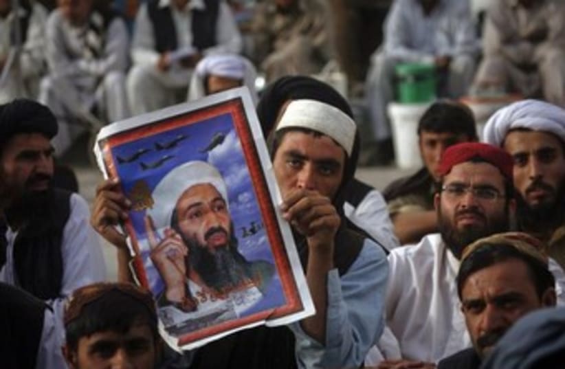 Osama bin Laden supporters in Pakistan 370  (photo credit: REUTERS/Naseer Ahmed )