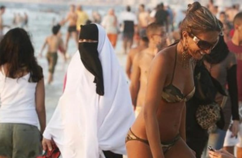 Woman in bikini on egypt beach 370 (photo credit: REUTERS)