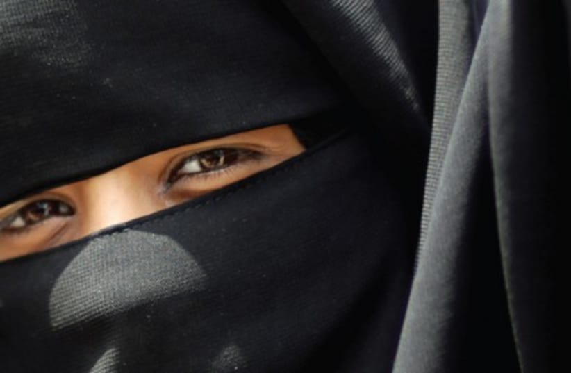 Islamic Woman521 (photo credit: MOHAMMED SALEM REUTERS)