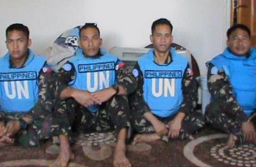 Photo of detained peacekeepers released by Syrian rebels 150 (photo credit: YouTube Screenshot)