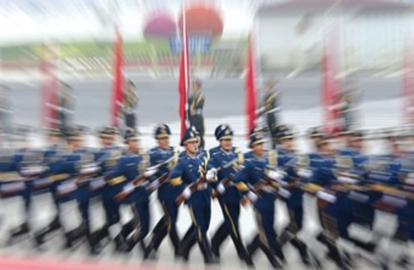 Chinese honor guard blurry 370 (photo credit: Kim Kyung-Hoon/Reuters)