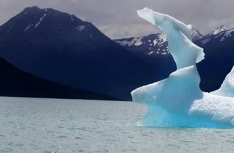 global warming ice caps melting 370 (photo credit: REUTERS)
