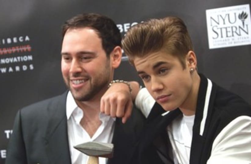 Scooter Braun and Justin Bieber 370 (photo credit: REUTERS)