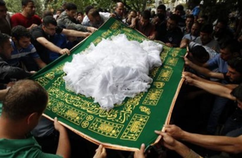 syria conflict funeral 370 (photo credit: REUTERS)