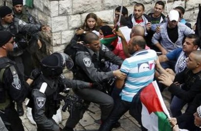 Palestinians clash with police Damascus Gate (file) 370 (photo credit: REUTERS/Ammar Awad)