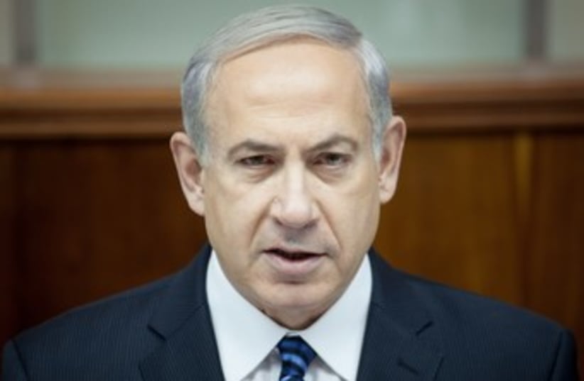 Netanyahu looking determined 370 (photo credit: Emil Salman/Haaretz/pool)