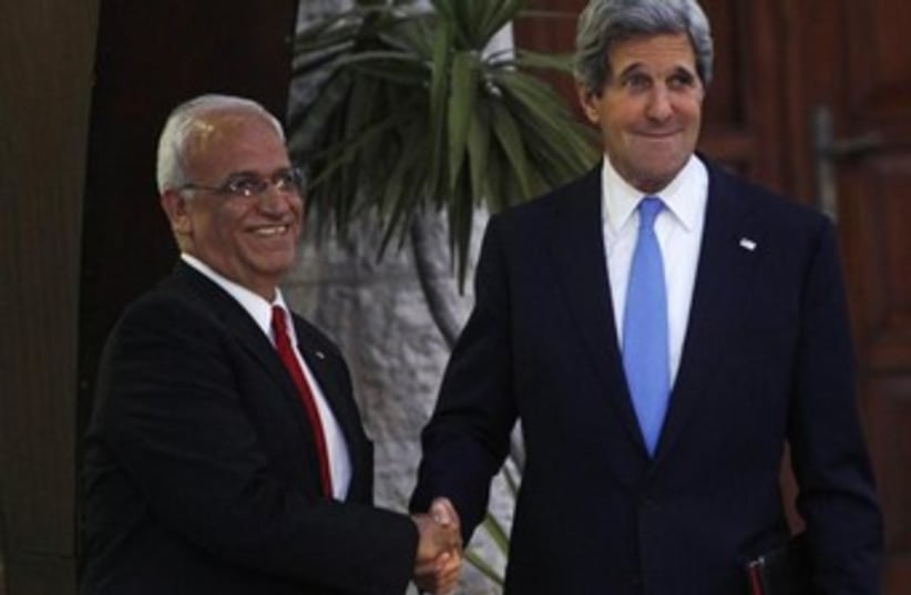 Kerry and Erekat shaking hands USE THIS ONE 370 (photo credit: REUTERS)
