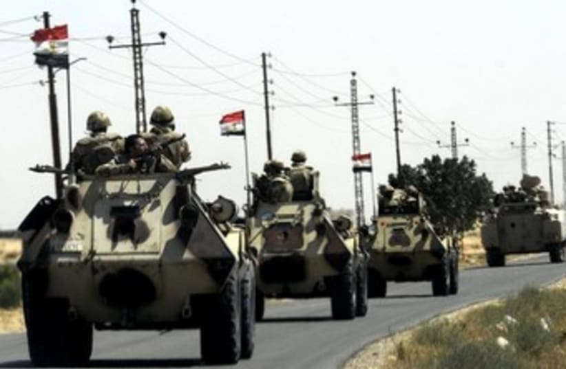 Egyptian military tanks, flags in Sinai (photo credit: REUTERS)