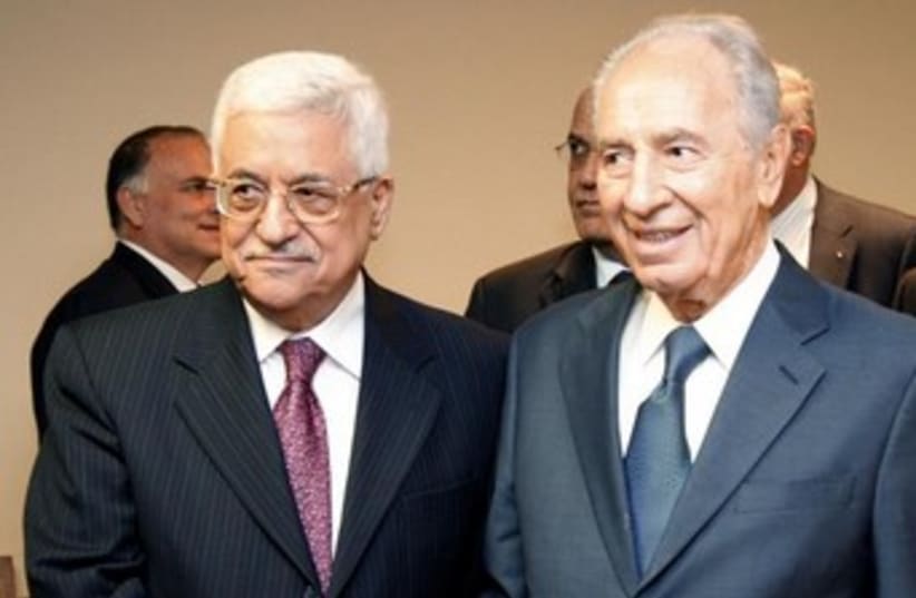 Abbas and Peres at the UN 370 (photo credit: REUTERS/Evan Schneider/UN Photo/Handout)