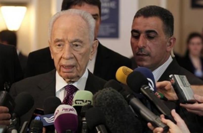 Peres at wec 26.5.13 370 (photo credit: Reuters)