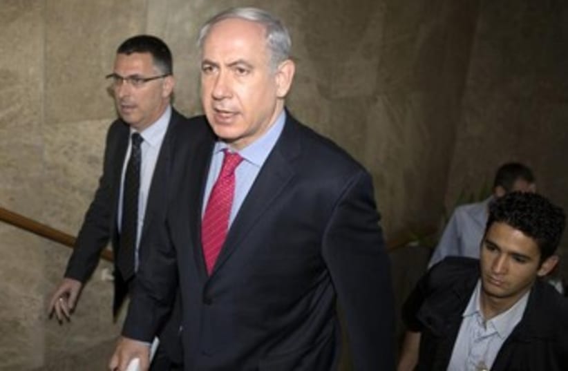 Netanyahu walking 370 (photo credit: REUTERS/Menahem Kahana/Pool)