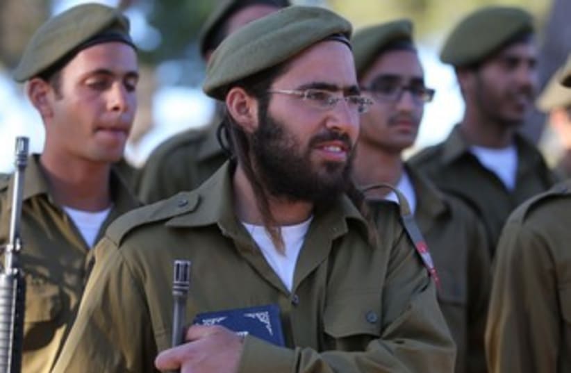 Netzah Yehuda Battalion swear in 370 (photo credit: Marc Israel Sellem/The Jerusalem Post)