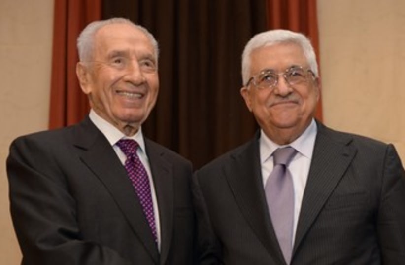 Shimon Peres and Abbas at WEF 370 (photo credit: Mark Neiman/GPO)