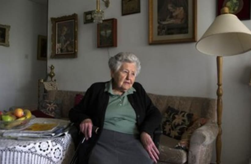 Hungarian-born Holocaust survivor Miriam Helman 370 (photo credit: REUTERS/Ronen Zvulun)