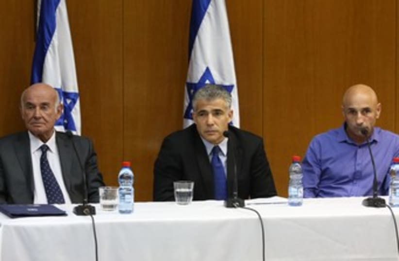 Lapid, Perry and Shelach hold press conference 370 (photo credit: Marc Israel Sellem/The Jerusalem Post)