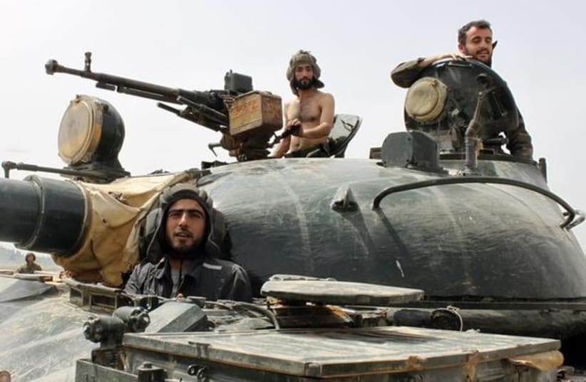 Syrian forces loyal to Assad370 (photo credit: Reuters)