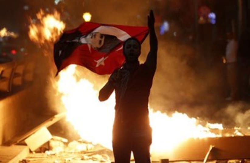 Turkey protest 370 (photo credit: REUTERS/Umit Bektas)