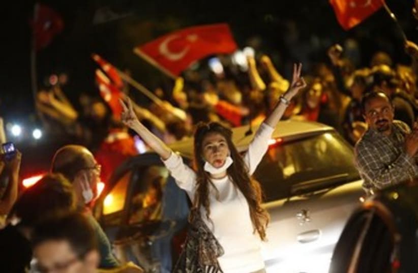 Anti-government protesters in Turkey (photo credit: REUTERS/Umit Bektas)
