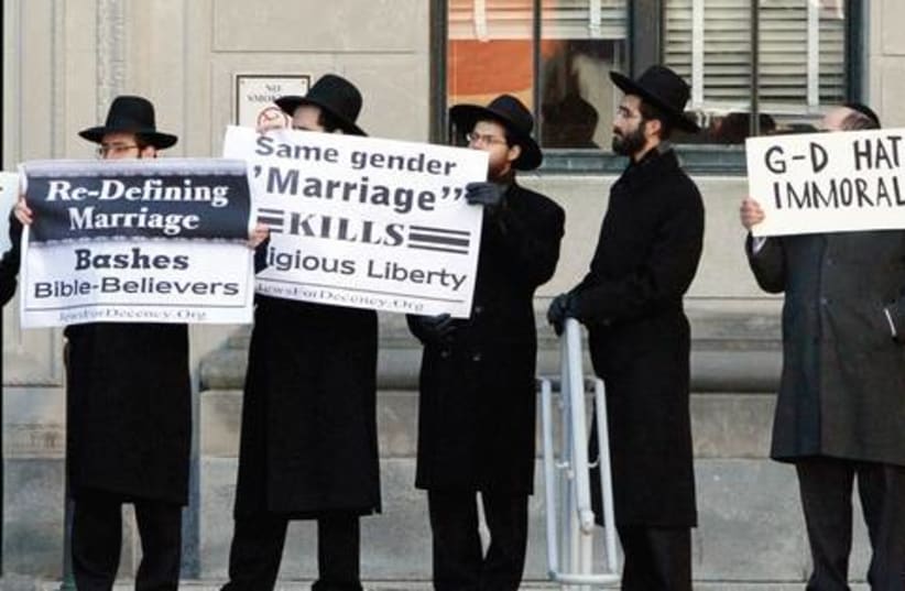 Orthodox Same Sex Protesters521 (photo credit: TIM SHAFFER / REUTERS)