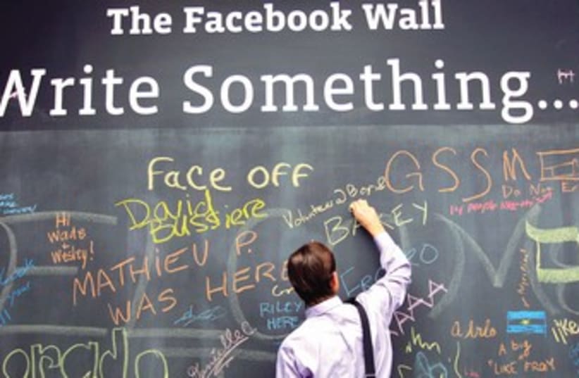 Facebook chalkboard 370 (photo credit: REUTERS)