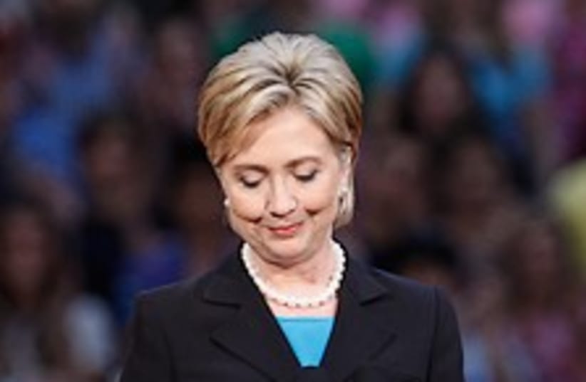 Clinton looks down 224.8 (photo credit: AP)