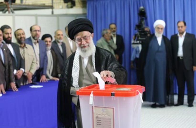Khamenei casts vote Iran elections 390 (photo credit: REUTERS/Fars News/Hassan Mousavi)