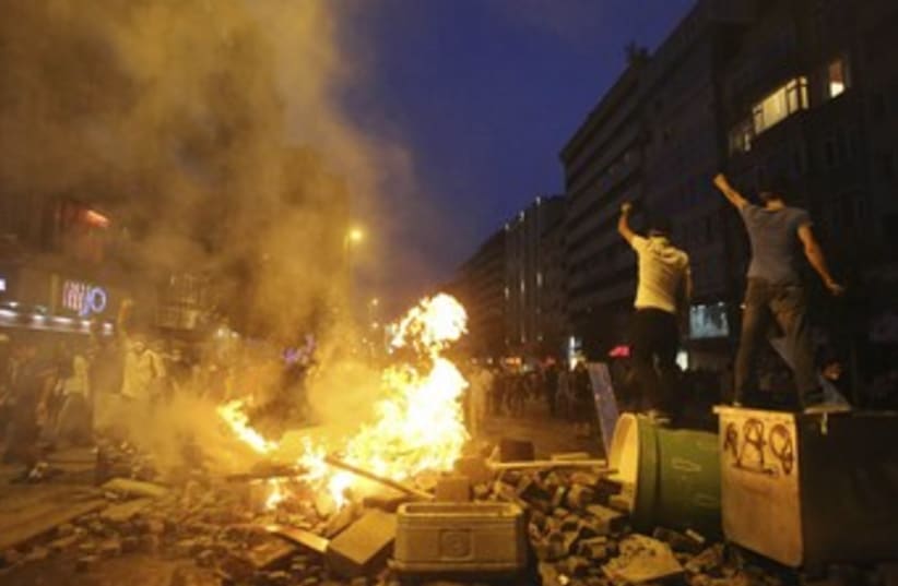 Turkey protestors on barricades 370 (photo credit: REUTERS/Serkan Senturk)