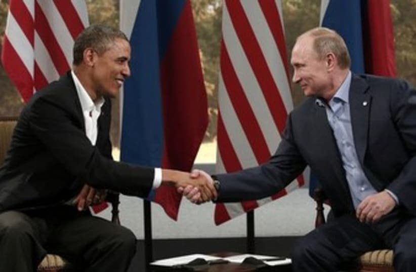 Obama and Putin at G8 summit 370 (photo credit: REUTERS/Kevin Lamarque )