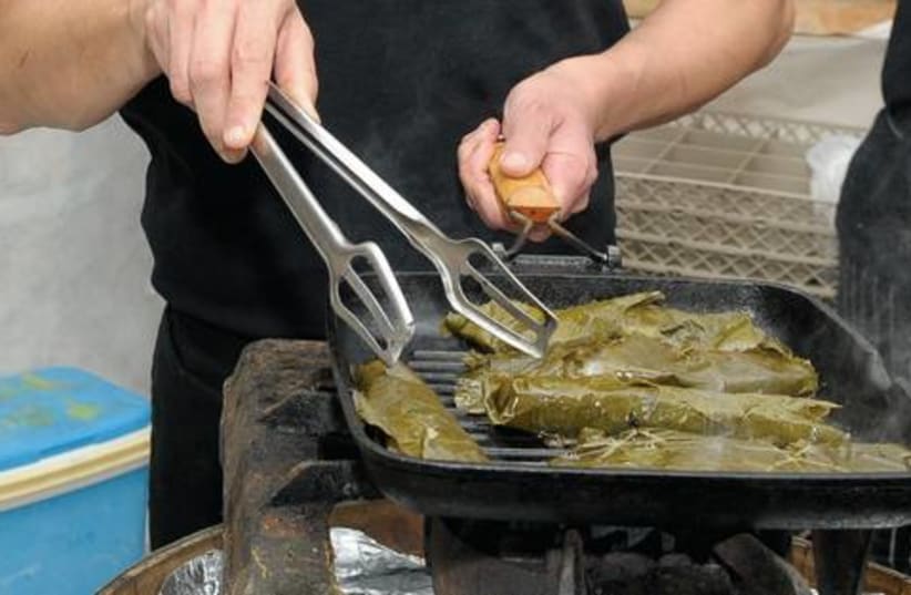 Cooking Grape Leaves521 (photo credit: Courtesy)