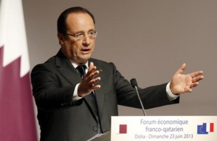 Hollande gesturing wildly, 370 (photo credit: REUTERS/Mohammed Dabbous)