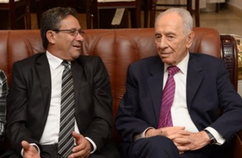 President Shimon Peres meets Abu Ghosh Mayor Abu Jaber 370 (photo credit: Mark Neiman/GPO)