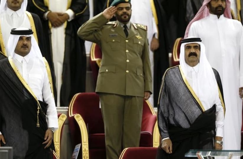 Qatari Emir with his son Sheikh Tamim370 (photo credit: Reuters)