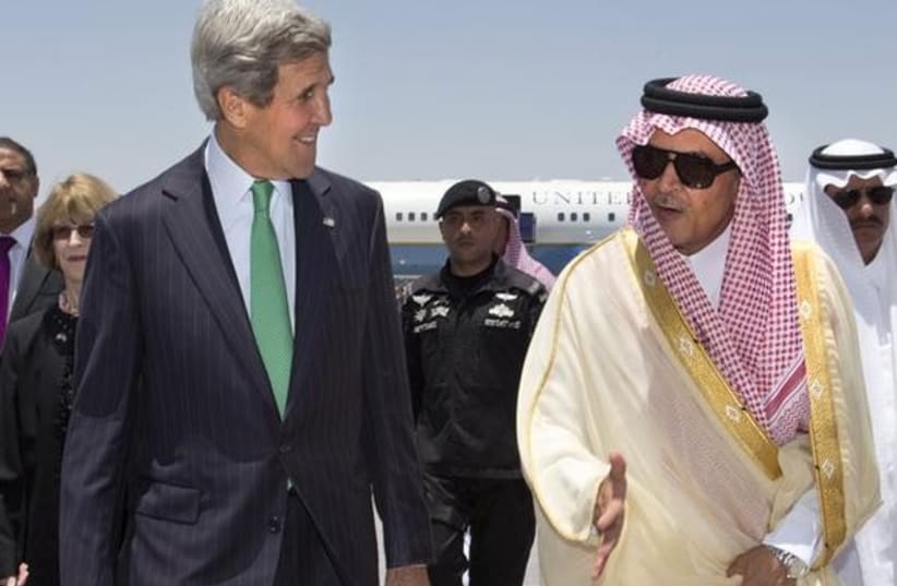 US Secretary of State Kerry greeted by Saudi Arabia's FM 370 (photo credit: Reuters)