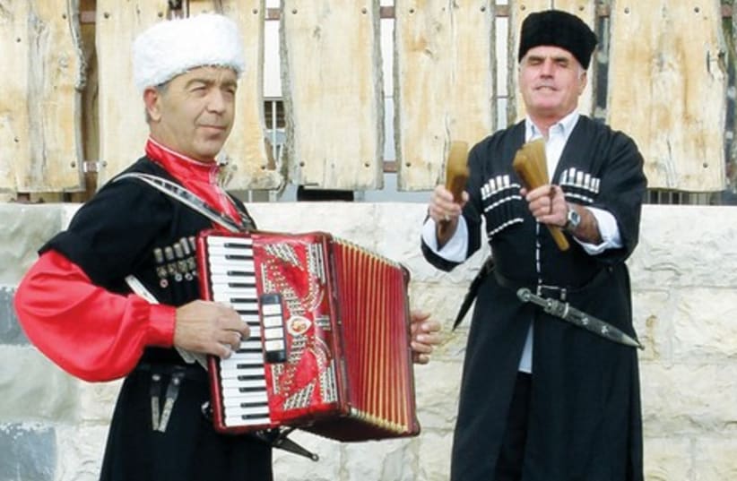 Circassian men in traditional garb (photo credit: Wikimedia Commons)