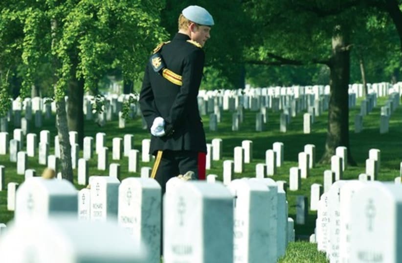 Prince Harry of Britain visits Arlington National Cemetery (photo credit: Reuters)