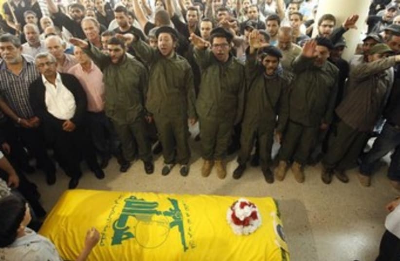 Hezbollah supporters at funeral of slain member 370 (photo credit: REUTERS)