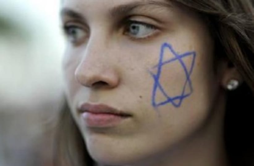 israeli girl with star of david painted on face 370 (photo credit: REUTERS)