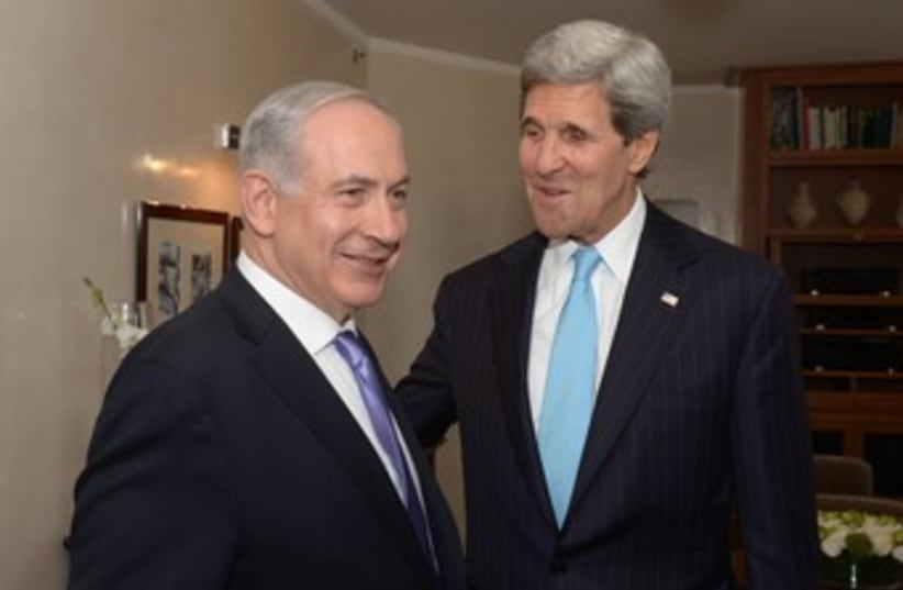 kerry meeting with netanyahu both smiling 370 (photo credit: GPO/Amos Ben Gershom)