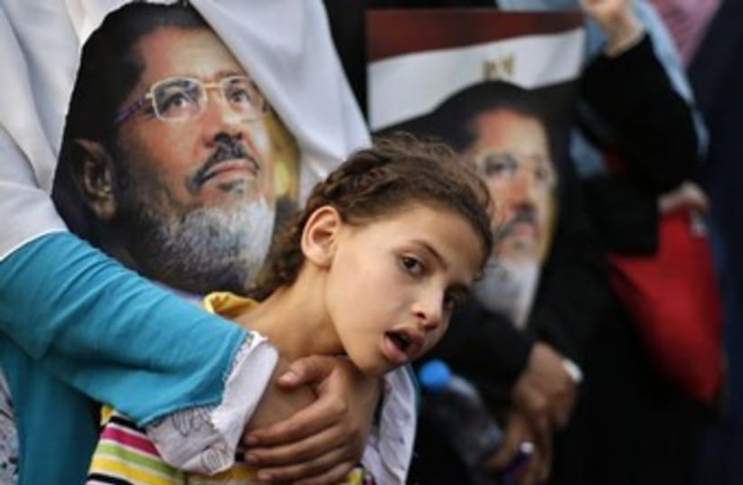 Supporters of Mohamed Morsi in Cairo370 (photo credit: Reuters)
