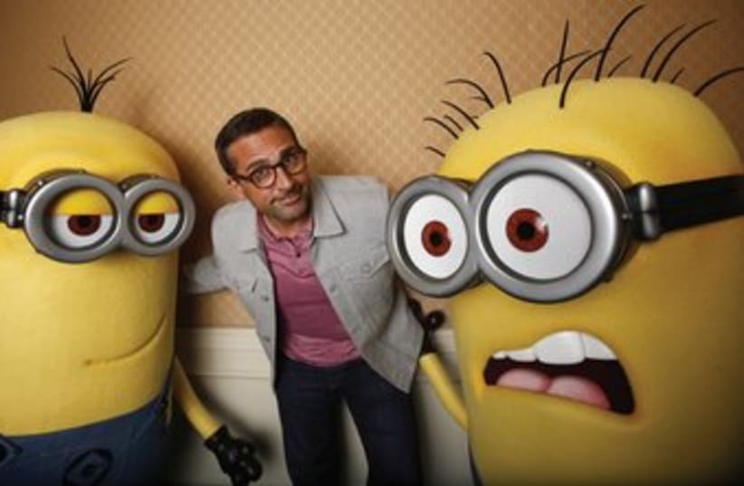 Steve Carell poses while promoting 'Despicable Me 2’ (photo credit: REUTERS/Mario Anzuoni)