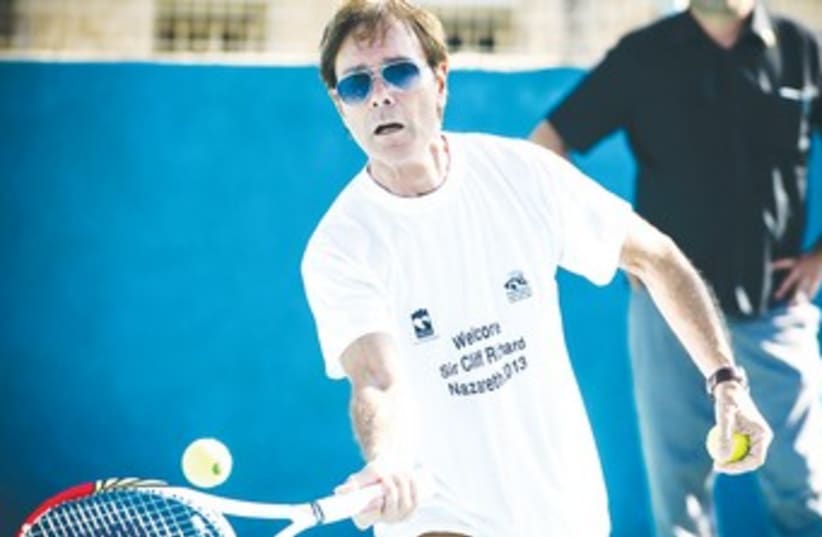 Sir Cliff Richard playing tennis in Nazareth370 (photo credit: David Katz)