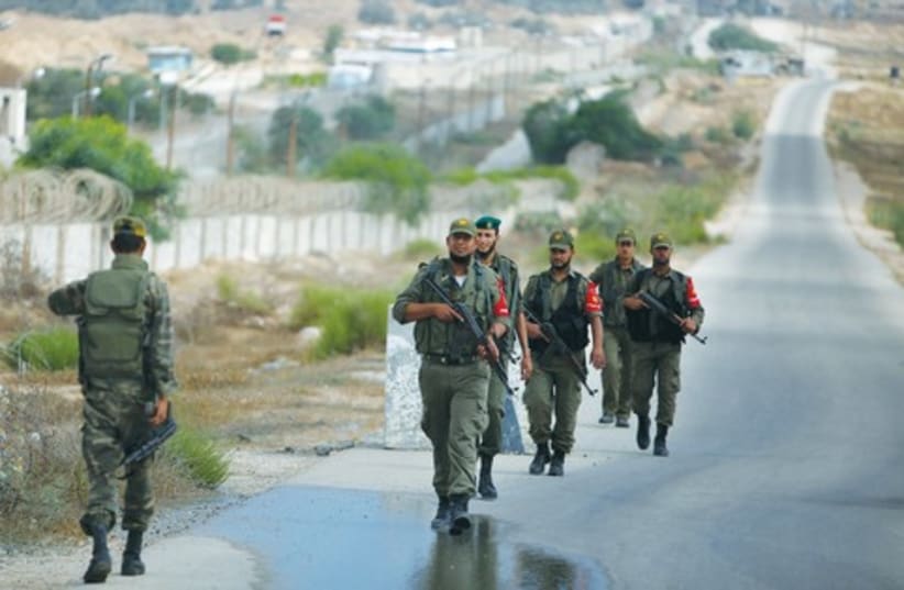 Palestinian troops loyal to Hamas on patrol 521 (photo credit: REUTERS)